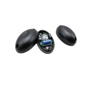 Sort infrar�d beam-sensor til alarmsystem, vist �bnet med elektronik synlig